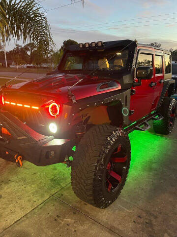 2012 Jeep Wrangler Unlimited for sale at Santana Auto in Altamonte Springs FL