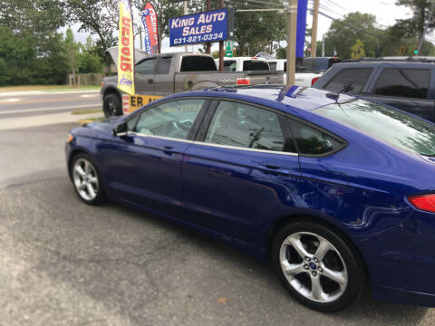 2013 Ford Fusion for sale at King Auto Sales INC in Medford NY