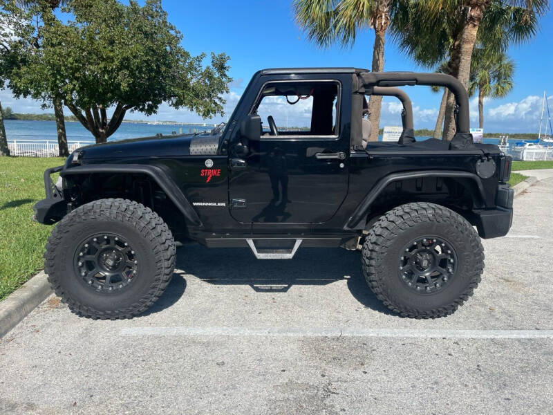 2009 Jeep Wrangler for sale at 5 Star Motorcars in Fort Pierce FL