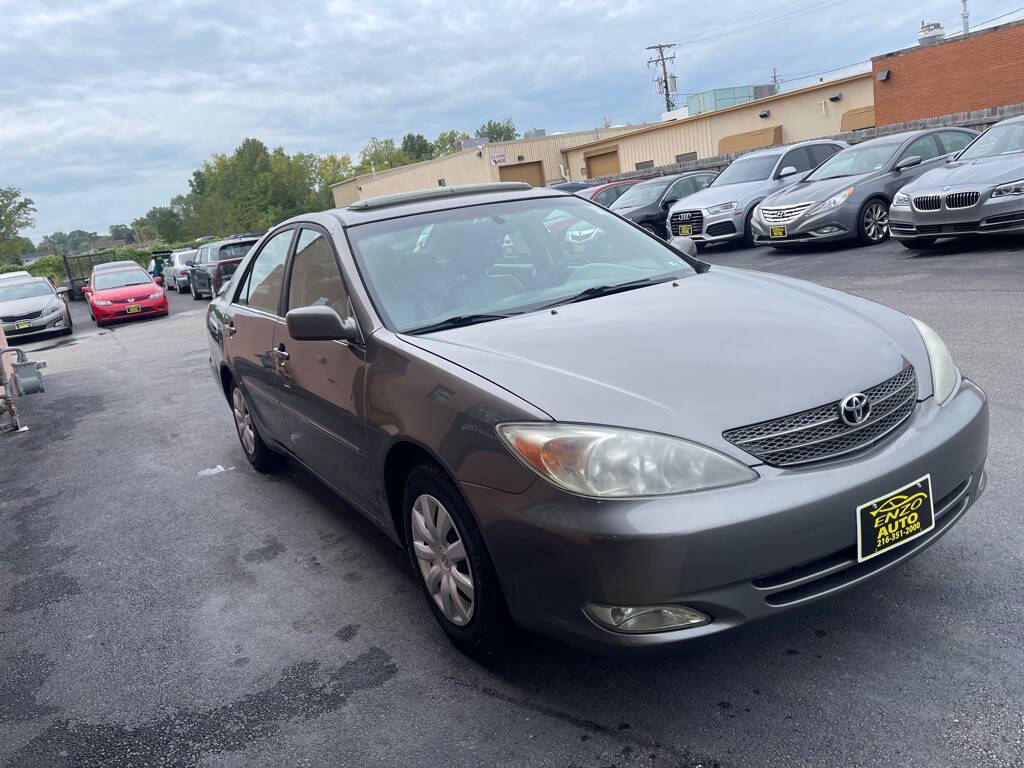 2003 Toyota Camry for sale at ENZO AUTO in Parma, OH