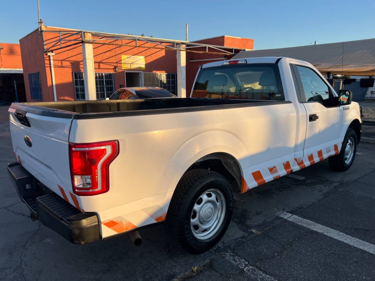 2016 Ford F-150 for sale at Unique Auto Sales, Inc. in Bell, CA