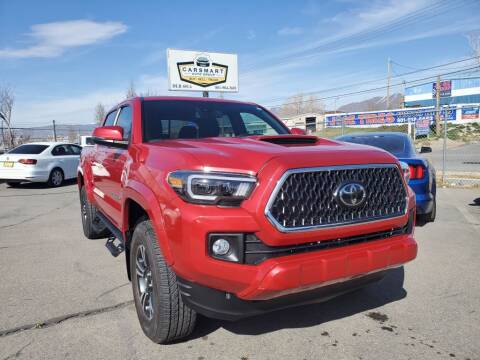 2019 Toyota Tacoma for sale at CarSmart Auto Group in Murray UT