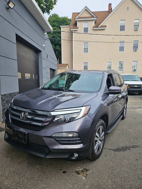 2016 Honda Pilot for sale at RENOS AUTO SALES LLC in Waterbury, CT