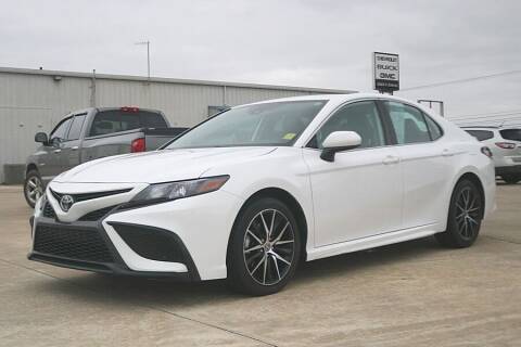 2021 Toyota Camry for sale at STRICKLAND AUTO GROUP INC in Ahoskie NC