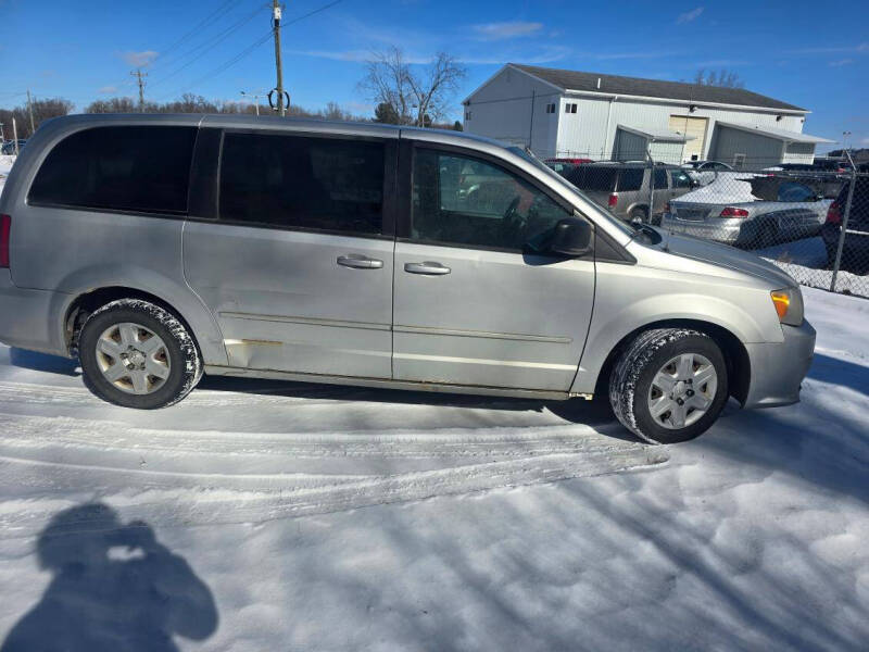 2012 Dodge Grand Caravan for sale at Expressway Auto Auction in Howard City MI