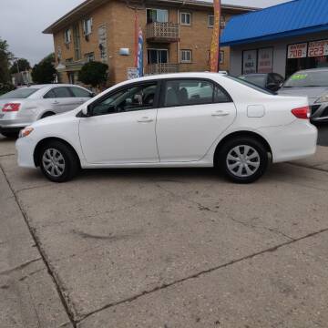 2011 Toyota Corolla for sale at ACTION AUTO GROUP LLC in Roselle IL