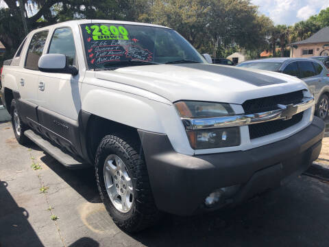 2003 Chevrolet Avalanche for sale at RIVERSIDE MOTORCARS INC - Main Lot in New Smyrna Beach FL