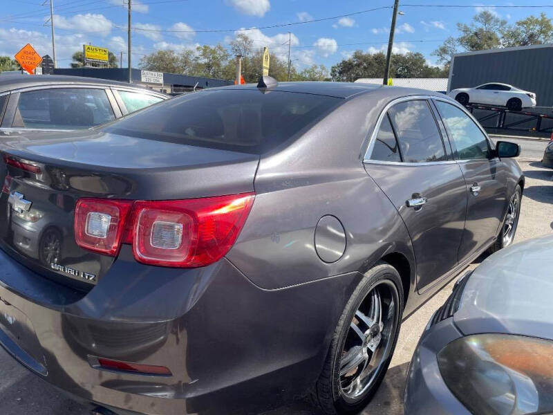 2013 Chevrolet Malibu for sale at STEECO MOTORS in Tampa FL