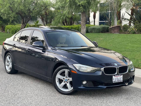 2013 BMW 3 Series for sale at MILLENNIUM MOTORS in Van Nuys CA