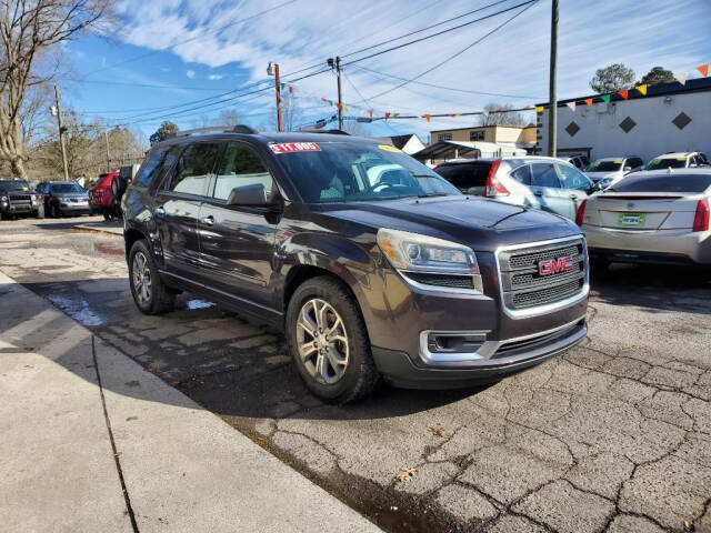 2014 GMC Acadia for sale at DAGO'S AUTO SALES LLC in Dalton, GA