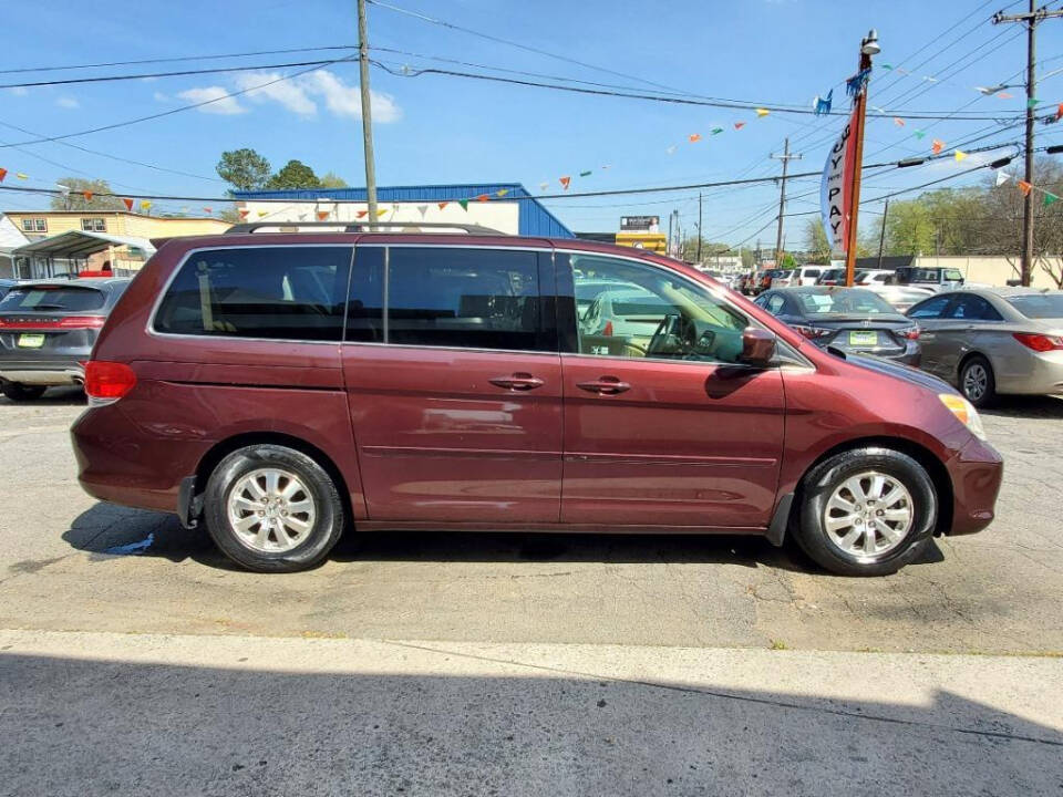 2010 Honda Odyssey for sale at DAGO'S AUTO SALES LLC in Dalton, GA