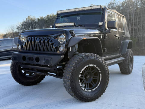 2014 Jeep Wrangler Unlimited for sale at Gwinnett Luxury Motors in Buford GA