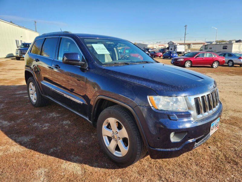 Used 2012 Jeep Grand Cherokee Laredo with VIN 1C4RJFAG4CC163756 for sale in Madison, SD