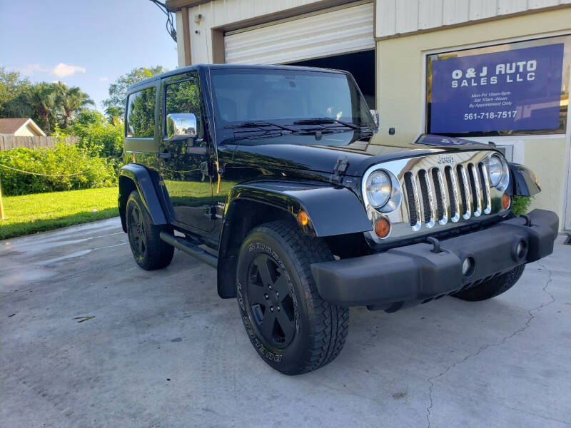 2011 Jeep Wrangler for sale at O & J Auto Sales in Royal Palm Beach FL