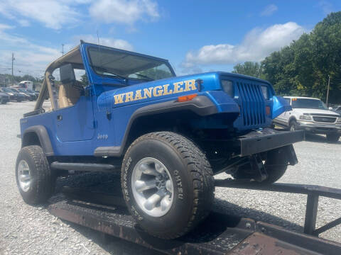 1991 Jeep Wrangler for sale at R & J Auto Sales in Ardmore AL