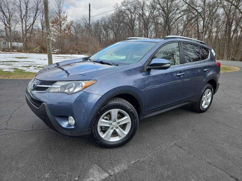 2013 Toyota RAV4 for sale at Depue Auto Sales Inc in Paw Paw MI