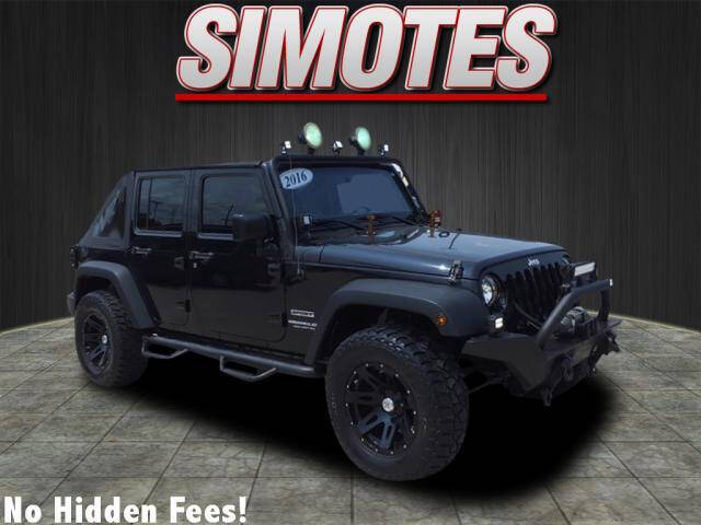 2016 Jeep Wrangler Unlimited for sale at SIMOTES MOTORS in Minooka IL