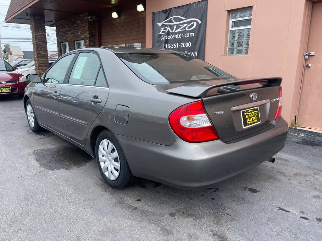 2003 Toyota Camry for sale at ENZO AUTO in Parma, OH