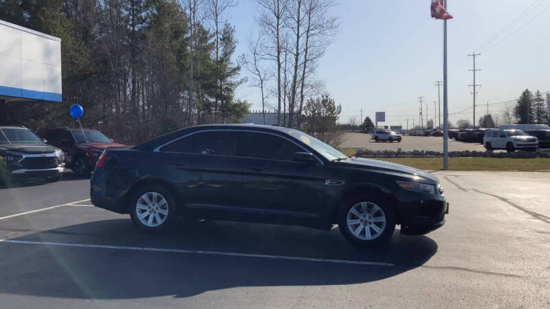 Used 2013 Ford Taurus SEL with VIN 1FAHP2E86DG130814 for sale in Ludington, MI