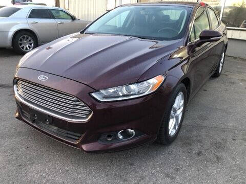 2013 Ford Fusion for sale at BELOW BOOK AUTO SALES in Idaho Falls ID