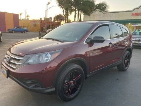 2014 Honda CR-V for sale at La Mesa Auto Sales in Huntington Park CA