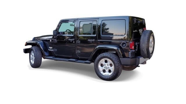 2014 Jeep Wrangler Unlimited for sale at Bowman Auto Center in Clarkston, MI