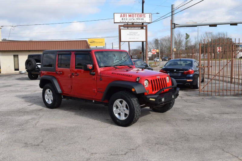 2014 Jeep Wrangler Unlimited for sale at ARI Motors in Houston TX