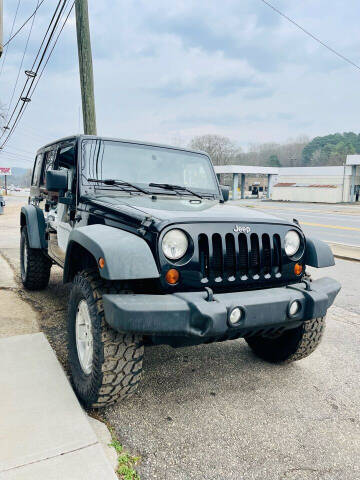 2012 Jeep Wrangler Unlimited for sale at Knox Bridge Hwy Auto Sales in Canton GA