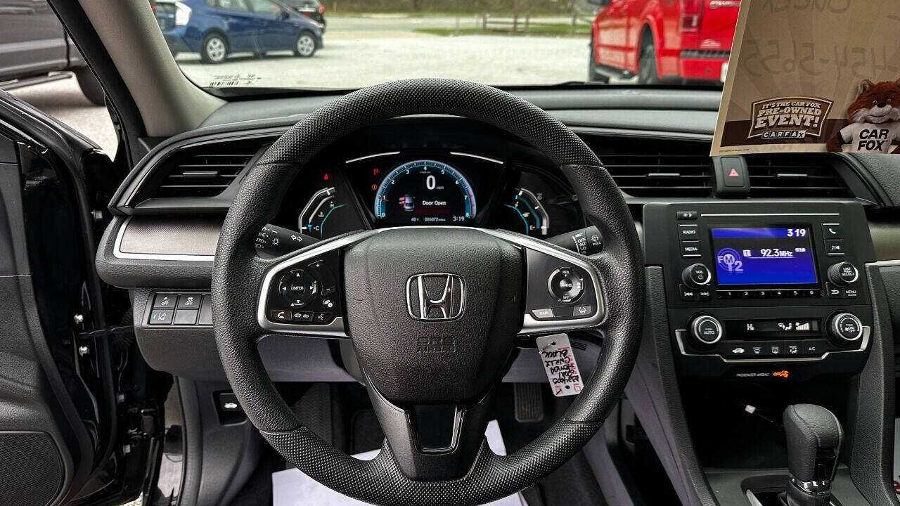 2021 Honda Civic for sale at North Ridge Auto Center LLC in Madison, OH