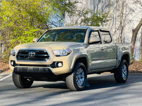 2016 Toyota Tacoma for sale at LOS PAISANOS AUTO & TRUCK SALES LLC in Norcross GA