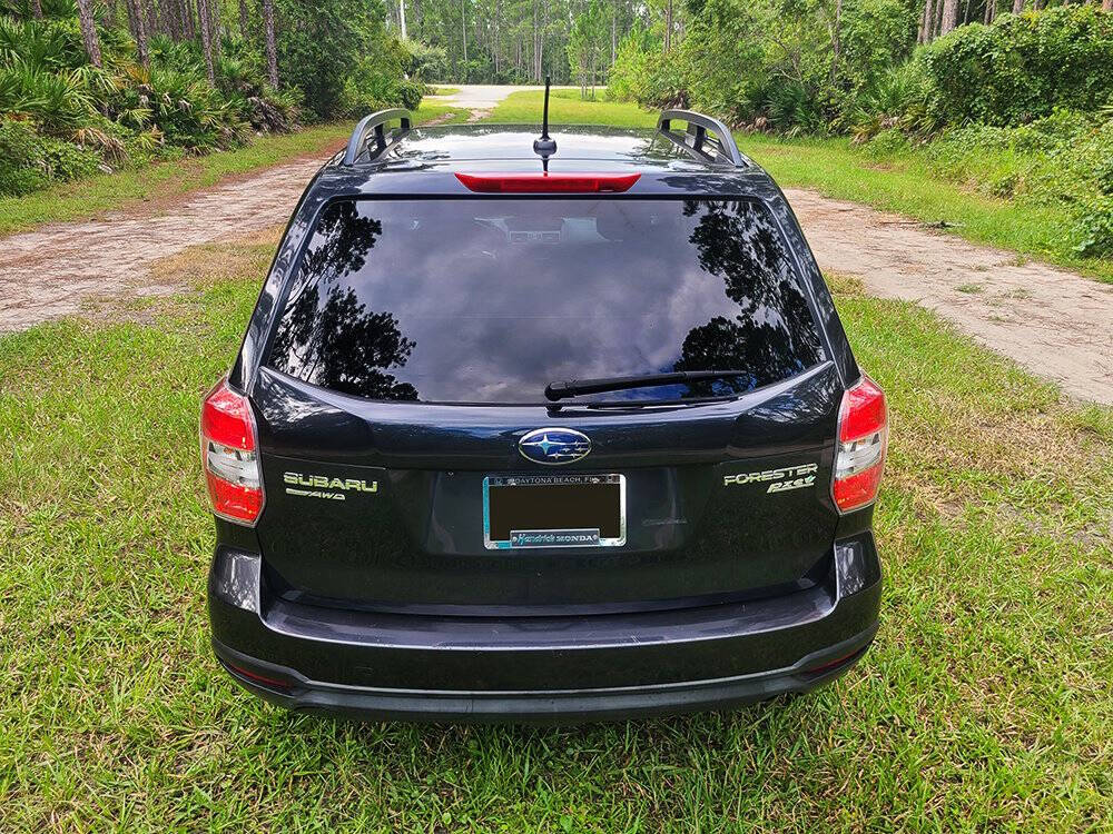 2014 Subaru Forester for sale at Flagler Auto Center in Bunnell, FL