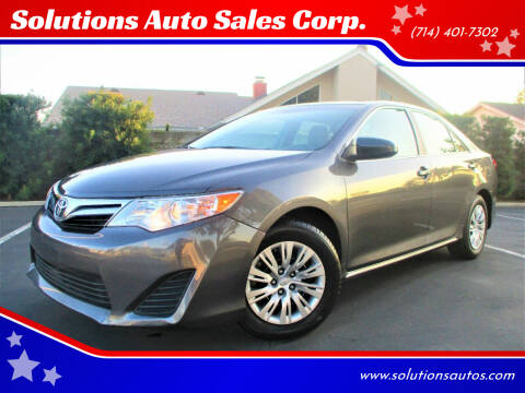 2014 Toyota Camry for sale at Solutions Auto Sales Corp. in Orange CA