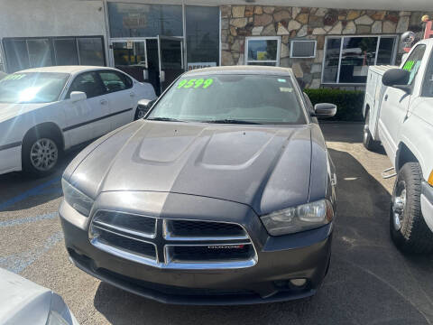 2014 Dodge Charger for sale at BASELINE AUTO SALES INC. in San Bernardino CA