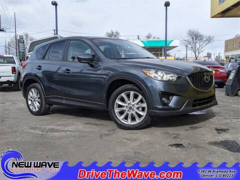 2013 Mazda CX-5 for sale at New Wave Auto Brokers & Sales in Denver CO