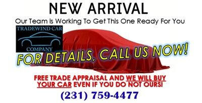 2012 Jeep Wrangler Unlimited for sale at Tradewind Car Co in Muskegon MI