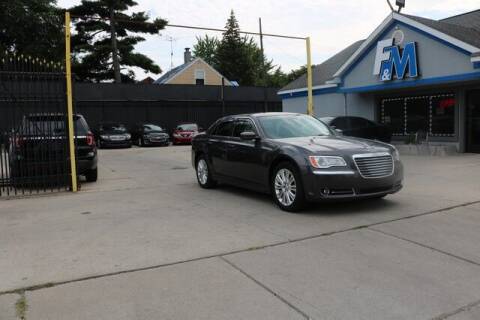 2014 Chrysler 300 for sale at F & M AUTO SALES in Detroit MI