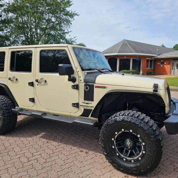 2012 Jeep Wrangler Unlimited for sale at CARS PLUS in Fayetteville TN