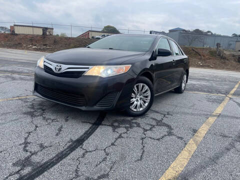 2014 Toyota Camry for sale at 4 Brothers Auto Sales LLC in Brookhaven GA