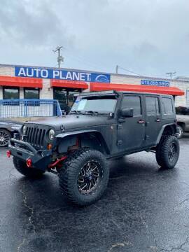 2009 Jeep Wrangler Unlimited for sale at Auto Planet in Murfreesboro TN