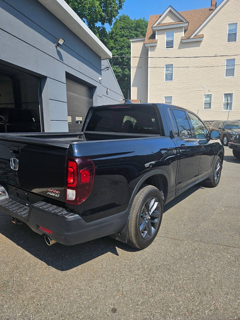 2021 Honda Ridgeline for sale at RENOS AUTO SALES LLC in Waterbury, CT