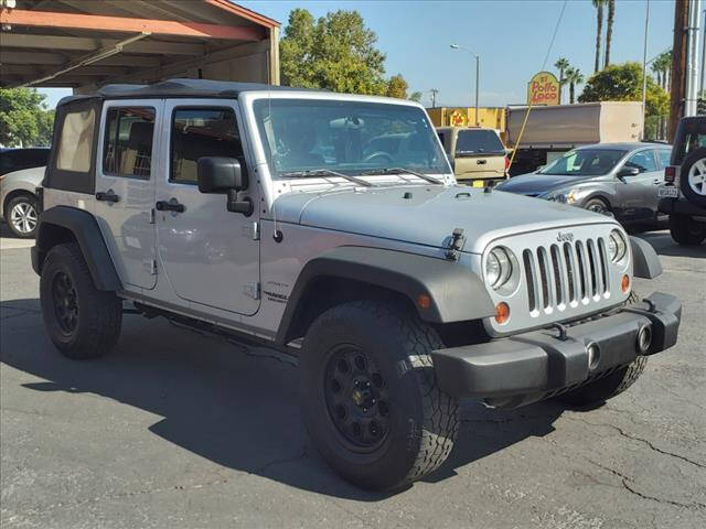2011 Jeep Wrangler Unlimited for sale at Corona Auto Wholesale in Corona CA