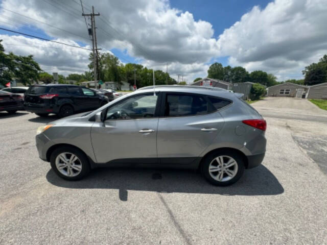 2011 Hyundai TUCSON for sale at Mitrione Motors in Springfield, IL