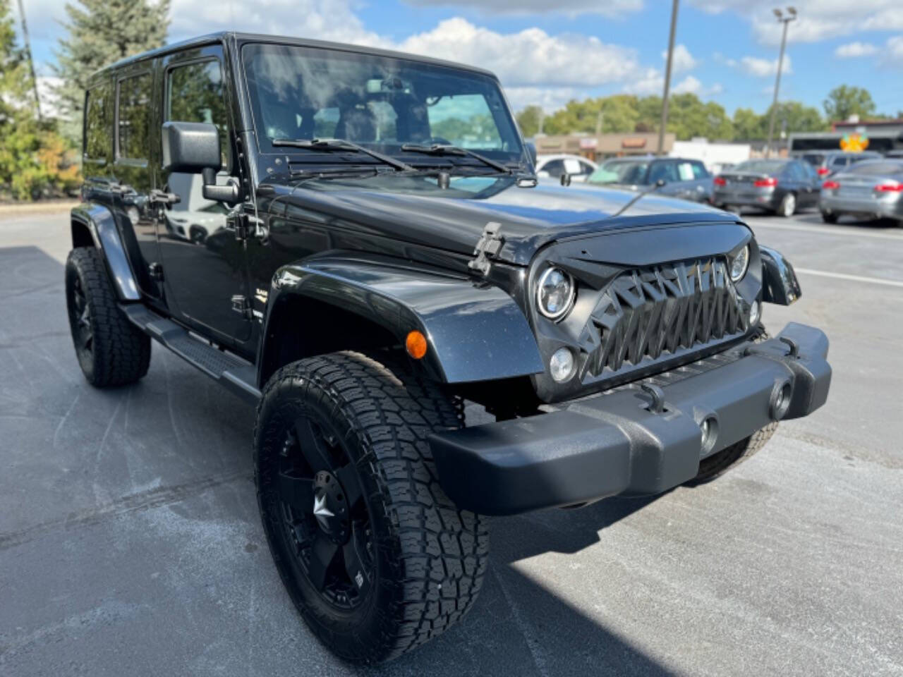 2014 Jeep Wrangler Unlimited for sale at Opus Motorcars in Utica, MI