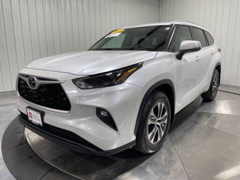 2022 Toyota Highlander for sale at HILAND TOYOTA in Moline IL