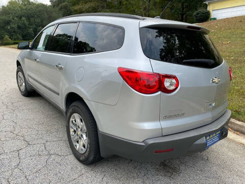 2009 Chevrolet Traverse for sale at Palmer Automobile Sales in Decatur GA
