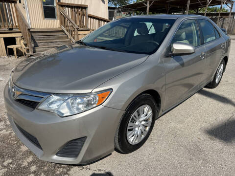 2014 Toyota Camry for sale at OASIS PARK & SELL in Spring TX