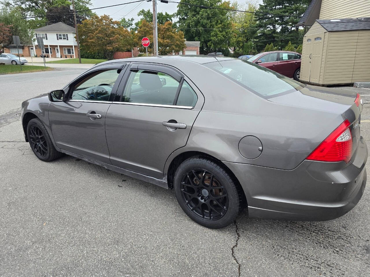 2011 Ford Fusion for sale at QUEENSGATE AUTO SALES in York, PA