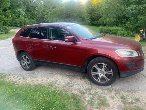 2011 Volvo XC60 for sale at Specialty Auto Inc in Hanson MA