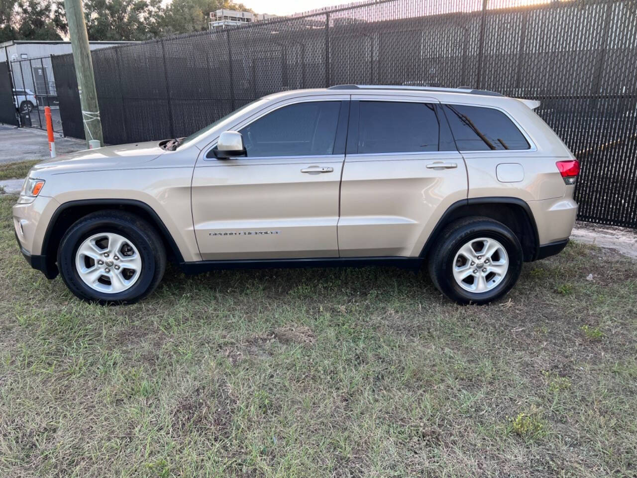 2014 Jeep Grand Cherokee for sale at Rose Automotive Solutions in Ocala, FL