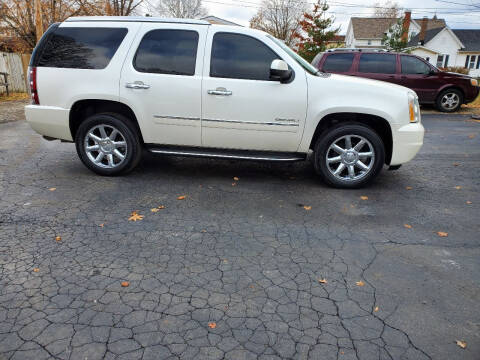 2011 GMC Yukon for sale at MADDEN MOTORS INC in Peru IN